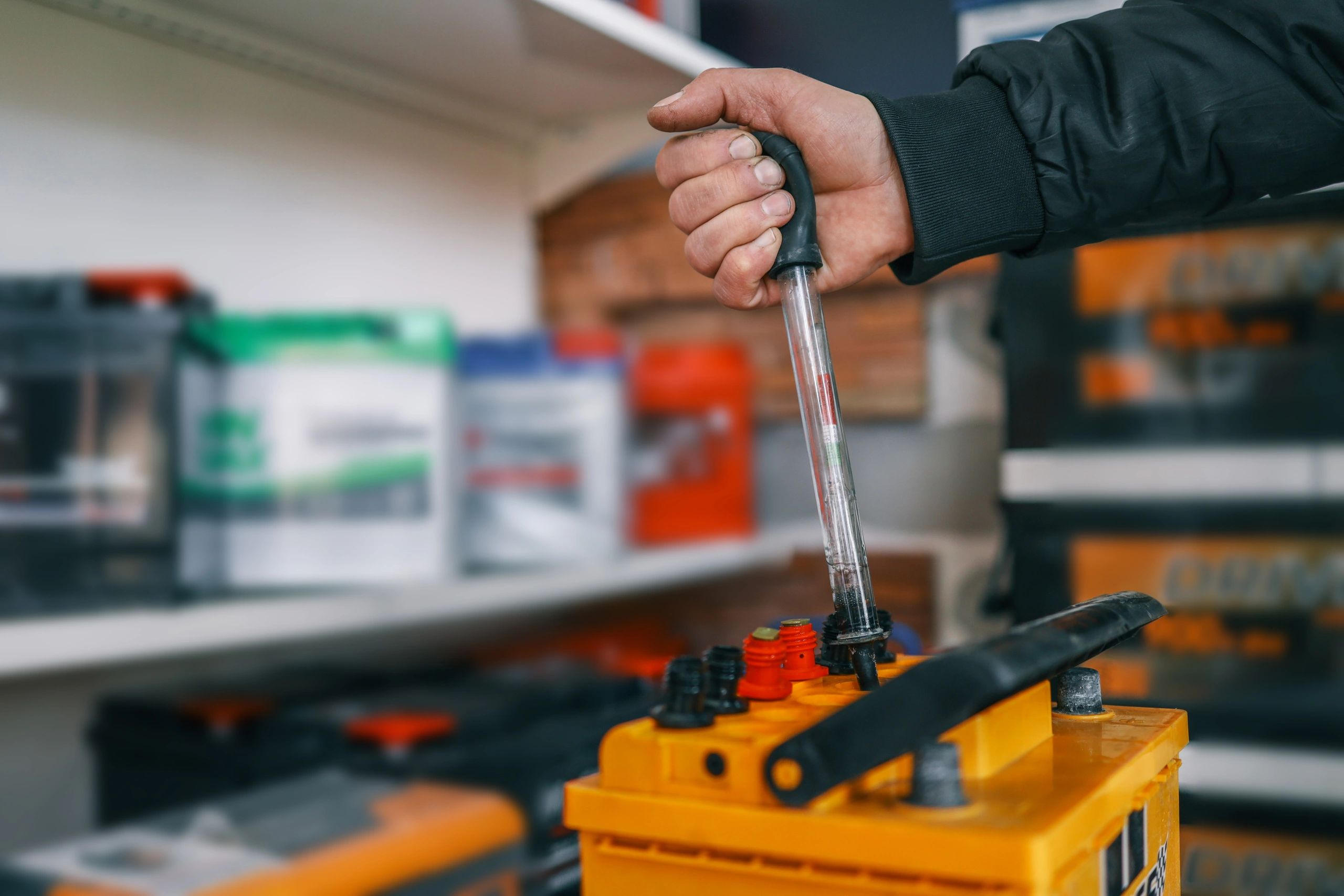 Testing an automotive battery with a hydrometer